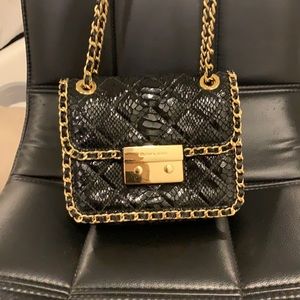 Michael Kors black snake print crossbody bag